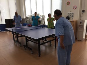 Residents playing ping-pong.